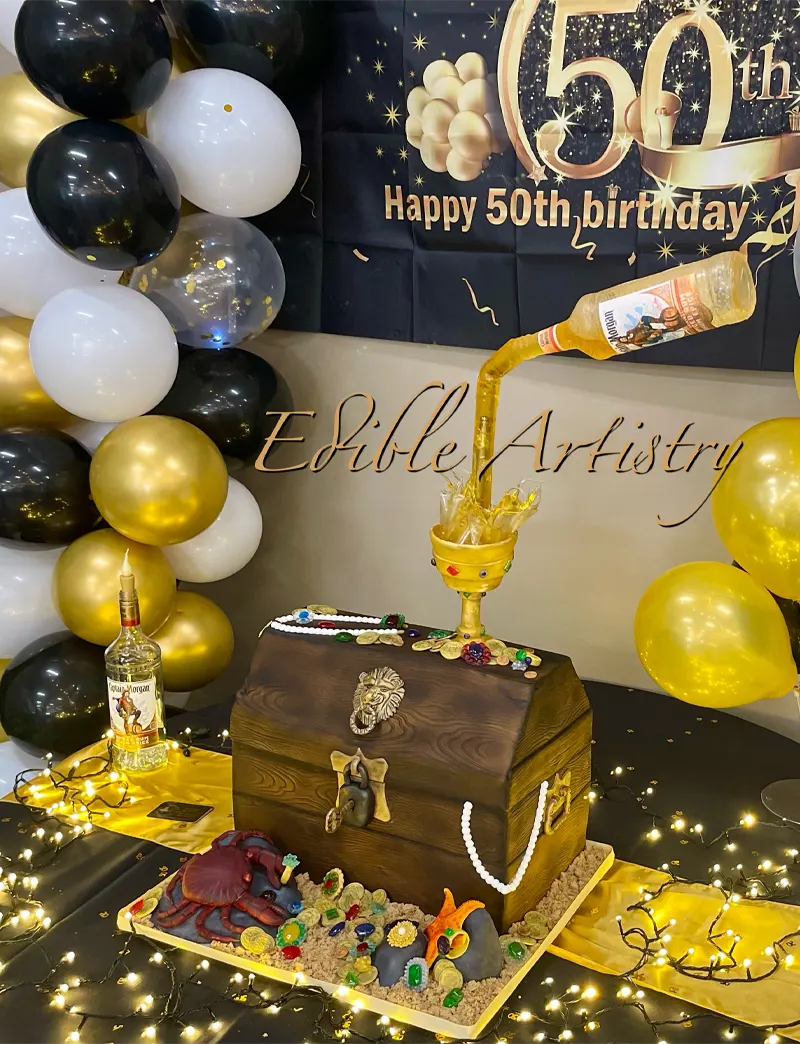 Pirate treasure chest cake with a floating bottle and edible treasure detailing
