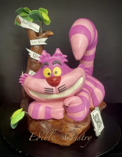 Custom Cheshire Cat cake with whimsical Alice in Wonderland detailing