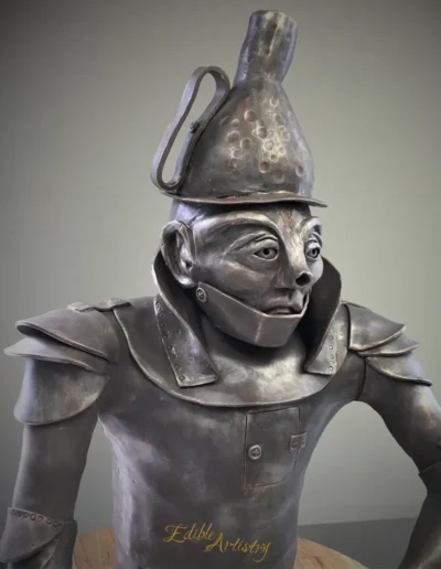 Wizard of Oz Tin Man sculpted cake with metallic edible detailing