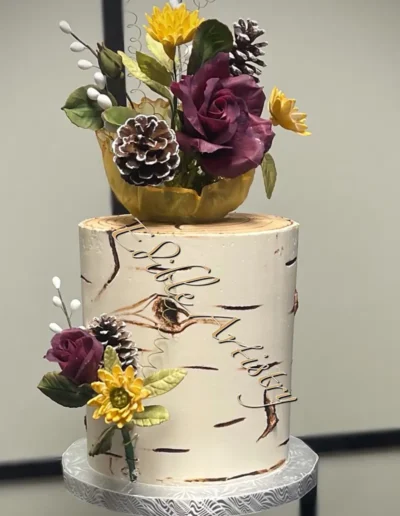 Rustic birch tree cake with floral and woodland-inspired detailing